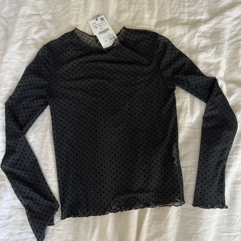 Mesh long sleeve polka dot shirt.